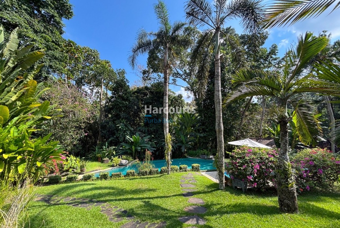 Within Lush Greenery Cepaka Swimming Pool